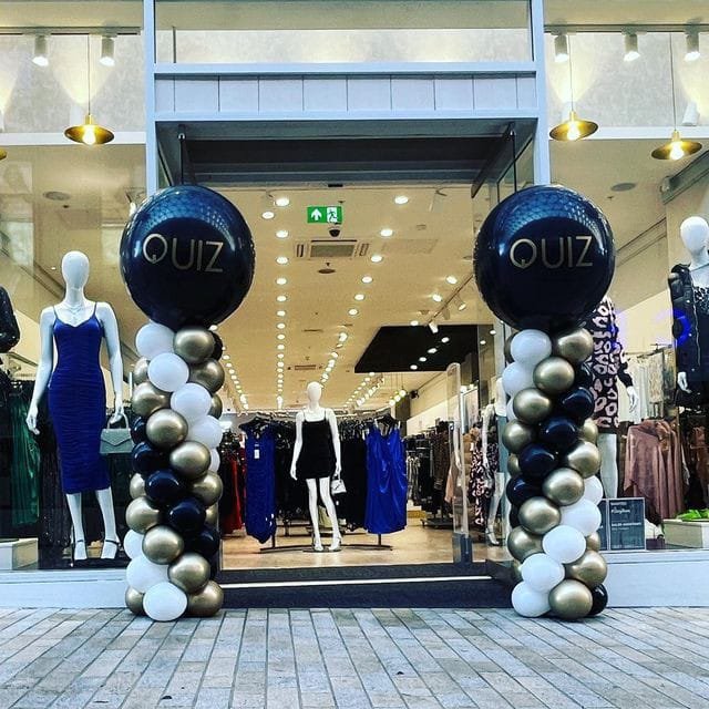 Black Gold and White Balloons Tower